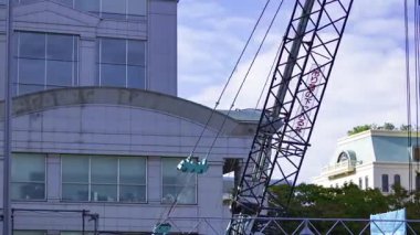 Tokyo 'da yapım aşamasındaki vinçlerin zaman çizelgesi. Yüksek kalite 4K görüntü. Minato bölgesi Aoyama Tokyo Japonya 10.23.2025