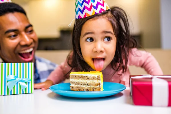 single father and his little daughter celebration birth day in kitchen