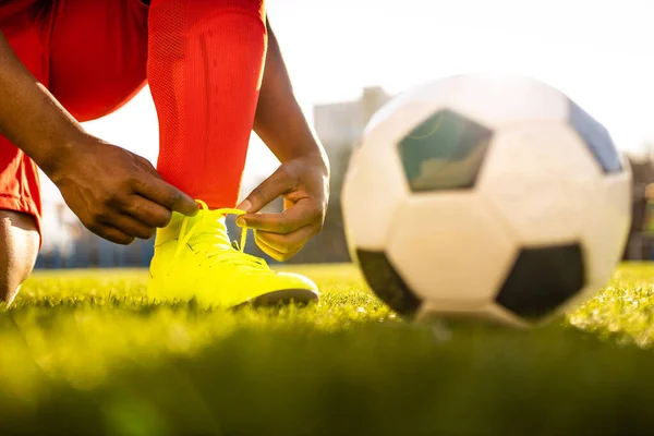 authentic happy football trainer working out outdoor in summer great day