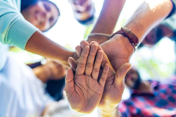 Diverse of big group of peoples hands together outdoors — Stock Photo, Image