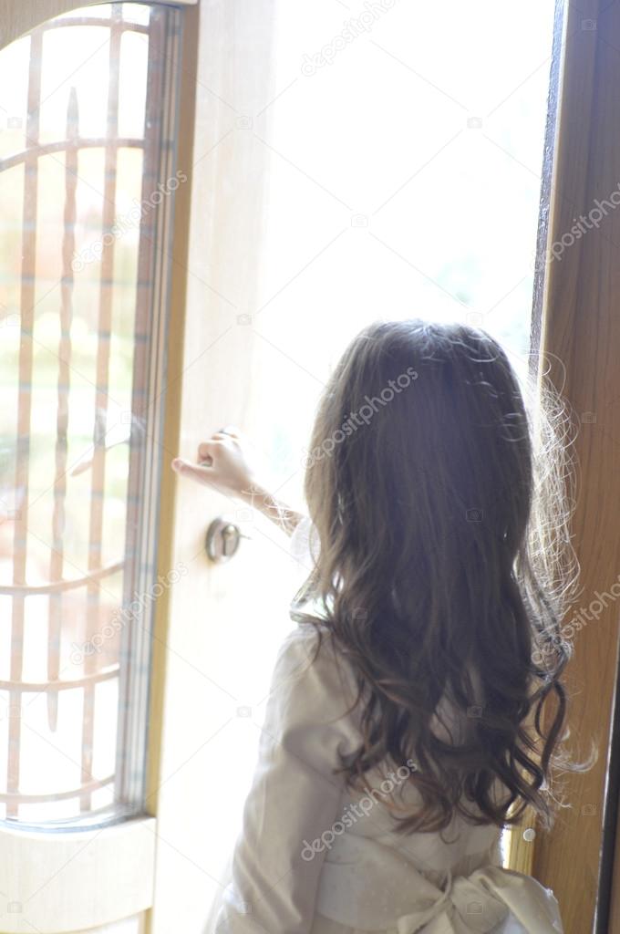 Little princess with open door