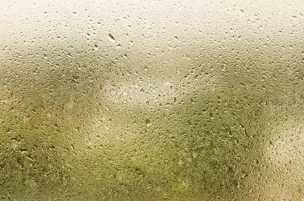 Gotas de água naturais no fundo de vidro da janela — Fotografia de Stock