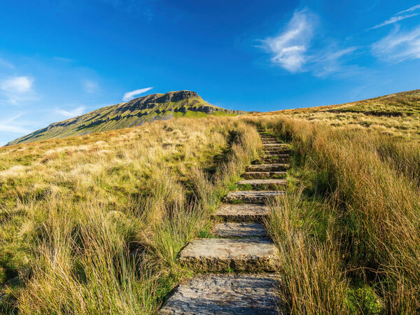 A path up Pen-y-ghent mountain in the Yorkshire Dales National Park. At 2,277 feet, this is one of the 'Three Peaks of Yorkshire'.