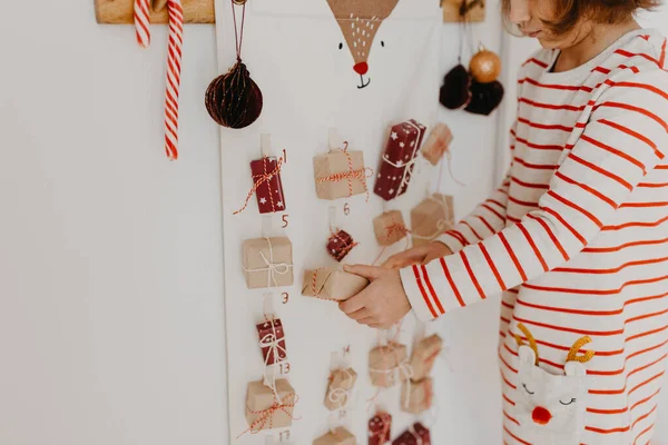 Cute Girl Opening Christmas Advent Calendar Gifts Wrapped Gifts Children — Stock Photo, Image