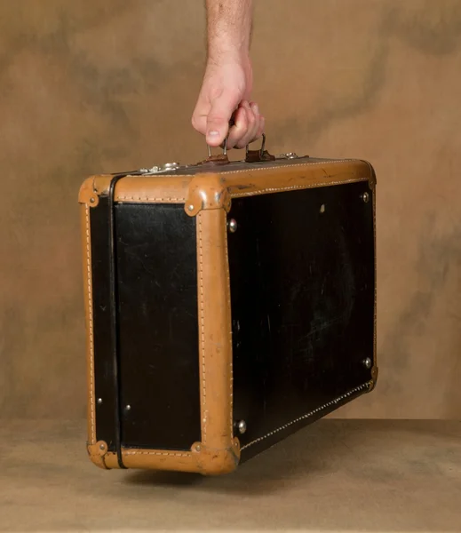 Man met een koffer — Stockfoto