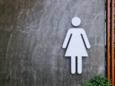 Çıplak Beton Duvarda Beyaz Kadınlar Tuvalet Sembolü