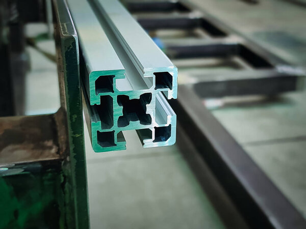 Close-up Cross Sectional Area of Aluminum Profile at Workshop