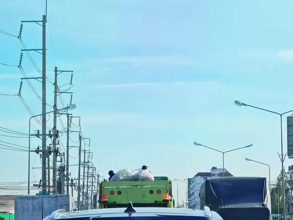 Unrecognizable Workers Sitting Garbage Truck Clear Blue Sky —  Fotos de Stock