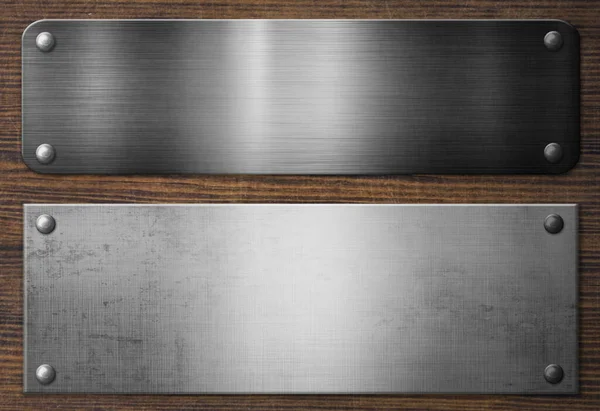 Ahşap bir dokuda perçin bulunan metal tabelalar. Ahşap arka planda eski çerçeveler. 3d illüstrasyon