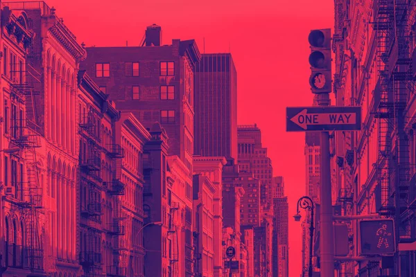 Buildings of SoHo in New York City with vibrant red and purple duotone color effect