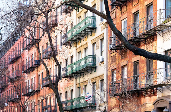 Block of colorful old buildings in the Upper East Side neighborhood of Manhattan in New York City NYC