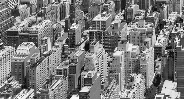 Black and White Panoramic view of tall crowded buildings in Manhattan, New York City
