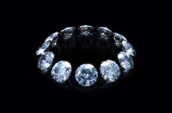 stock image A close up view of a circular array of cut diamonds on a black isolated background - 3D render