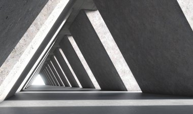 Üç köşeli geometrik şekillerden oluşan ve boşluklardan geçen bir ışık demeti olan beton tünele bir bakış.