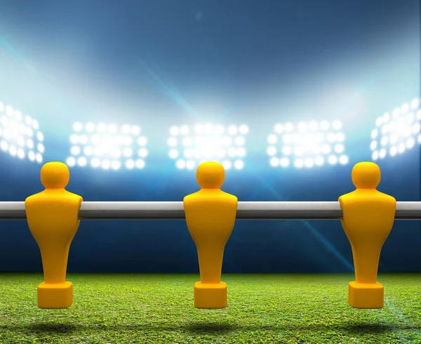 Floodlit Stadium With Foosball Players — Stock Photo, Image