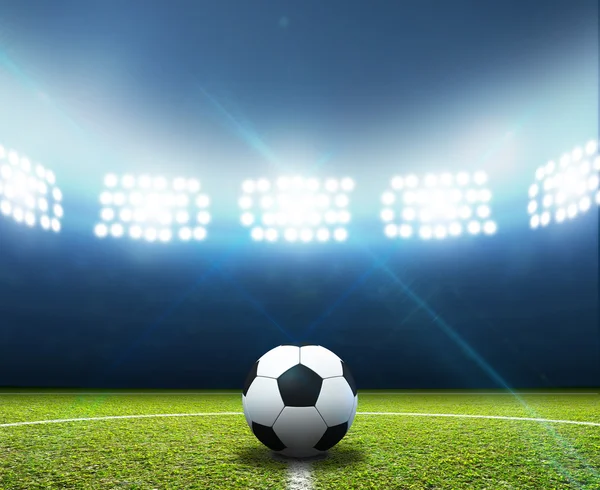 Стадион и футбольный мяч — стоковое фото