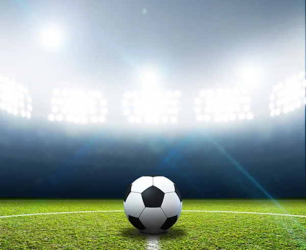 Стадион и футбольный мяч — стоковое фото
