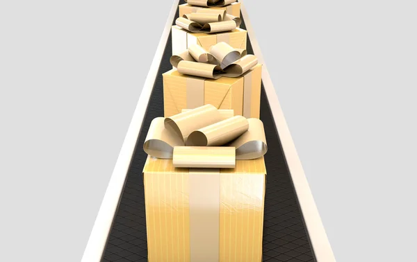 Altın hediye kutusu konveyör üzerine sarılmış — Stok fotoğraf