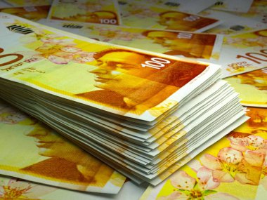 İsrail 'in parası. İsrail 'in yeni şekel paraları. ILS banknotları. 100 şekel. İş, finans, haber geçmişi.