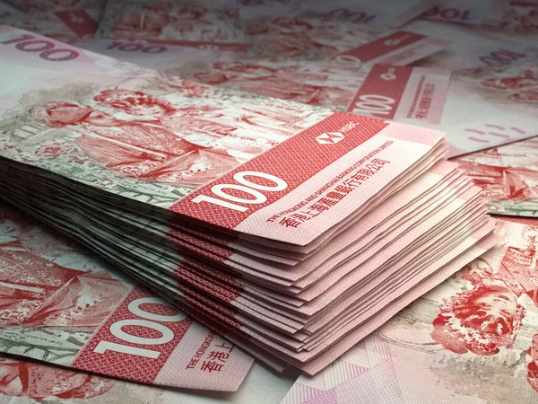 Money of Hong Kong. Hong Kong dollar bills. HKDHSBC banknotes. 100 dollars. Business, finance, news background.