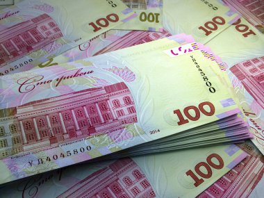 Ukrayna 'nın parası. Ukrayna Hryvnia faturaları. UAH banknotları. 100 hryvni. İş, finans, haber geçmişi.