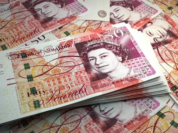 Money of United Kingdom. Pound sterling bills. GBP banknotes. 50 pounds. Business, finance, news background.