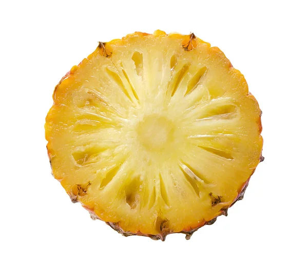 One yellow round pineapple slice isolated on white background. Bright exotic fruit in a section. View from above. Image without background for juice packaging design, organic food. Piece of fruit.