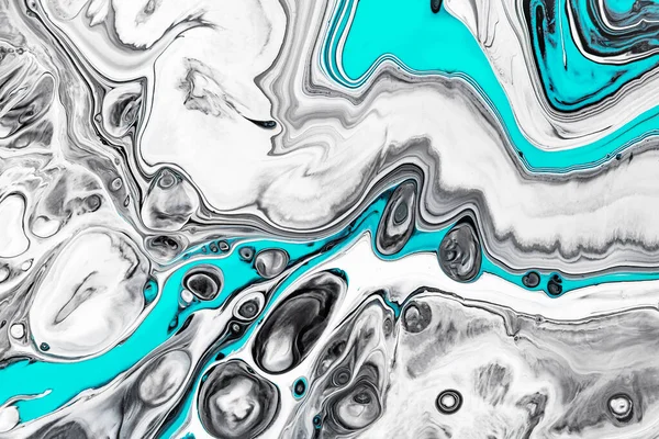 Fluid art texture. Abstract background with mixing paint effect. Liquid acrylic artwork that flows and splashes. Mixed paints for posters or wallpapers. Gray, white and aquamarine overflowing colors.