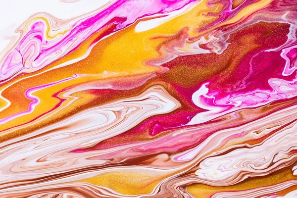 Fluid art texture. Abstract background with iridescent paint effect. Liquid acrylic artwork with flows and splashes. Mixed paints for posters or wallpapers. Golden, white and ruby overflowing colors.