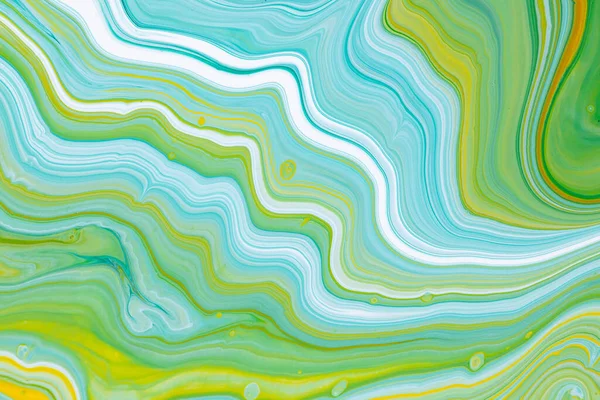 Fluid art texture. Backdrop with abstract swirling paint effect. Liquid acrylic picture with artistic mixed paints. Can be used for baner or wallpaper. Blue, yellow and green overflowing colors.