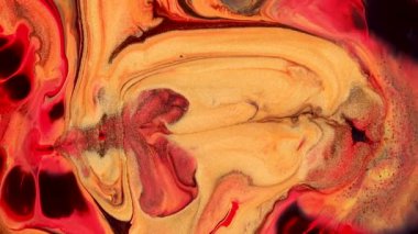 Akışkan resim görüntüleri, akrilik akrilik dokular ve akışkan bir etkisi var. Sıvı boya arka planda sıçrama ve girdapla karışımı. Sarı, siyah ve kırmızı taşan renklerle ayrıntılı arkaplan hareketi.