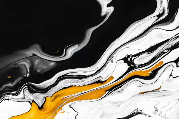 Fluid art texture. Abstract backdrop with swirling paint effect. Liquid acrylic picture with flows and splashes. Mixed paints for posters or wallpapers. Golden, black and white overflowing colors.