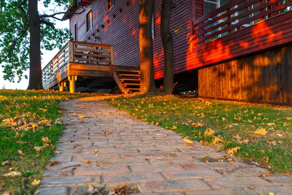 Contemporary wooden single family house. Perfect getaway. Wooden house on a island with oaks. organic architecture.