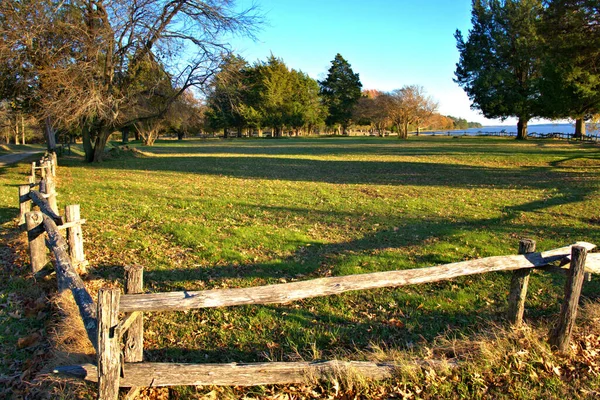 Sun Shadows Golden Hour Approaches Scenic Landscape Surrounded Split Rail — Stock Photo, Image