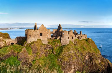 Ruin of Dunluce castle in Northern Ireland clipart