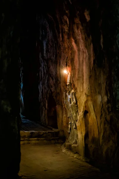 Beautiful sacred Am Phu Cave in Marble mountains, Danang, Vietnam. Buddhist vision of hell and heaven in Ngu Hanh Son Pagoda