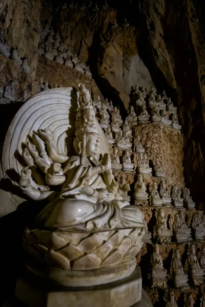 Beautiful sacred Am Phu Cave in Marble mountains, Danang, Vietnam. Buddhist vision of hell and heaven in Ngu Hanh Son Pagoda