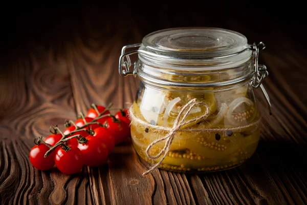 Natural diy marinated green tomatoes in a jar — Stock Photo, Image