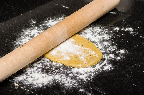 Homemade dough being formed into pasta — Stock Photo, Image