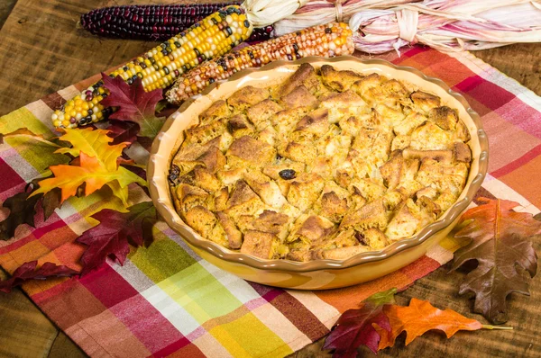 Raisin bread pudding desert with fall decorations — Stock Photo, Image