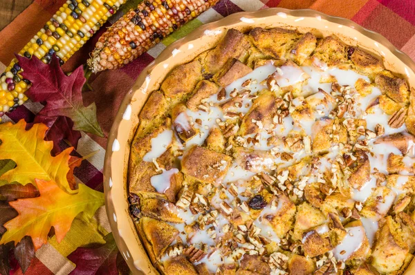 Raisin bread pudding desert with fall decorations — Stock Photo, Image