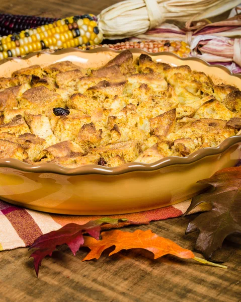 Raisin bread pudding desert with fall decorations — Stock Photo, Image