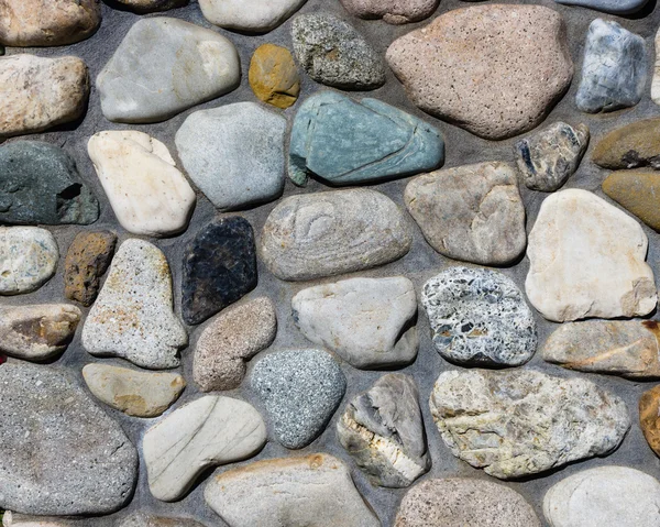Fiume muro di pietra con giunti di malta — Foto Stock