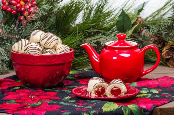 Festive holiday filled cookies and tea — Stock Photo, Image