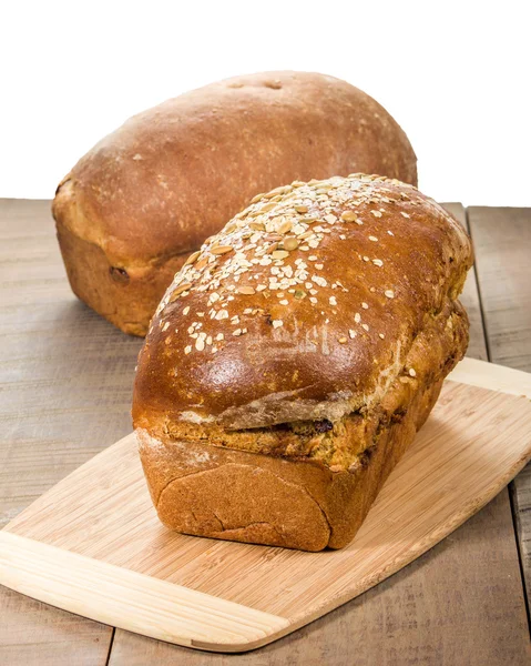 Loaves of fresh whole wheat bread — Stock Photo, Image