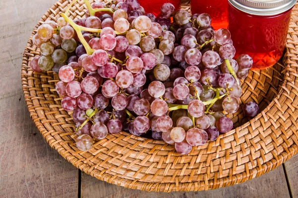 Overhead of jars of pink grape jelly — Stock Photo, Image