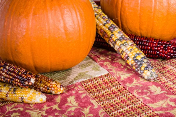 Fall display of orange pumpkins and corn — Stock Photo, Image