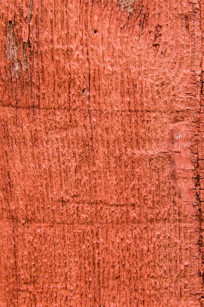 Red painted rough wooden siding board — Stock Photo, Image