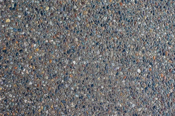 Pebbled concrete surface for use as texture — Stock Photo, Image