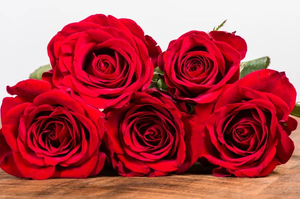 Five red roses in a group — Stock Photo, Image